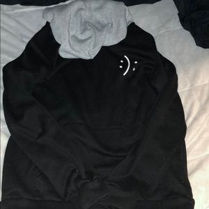 Black and grey hoodie with print